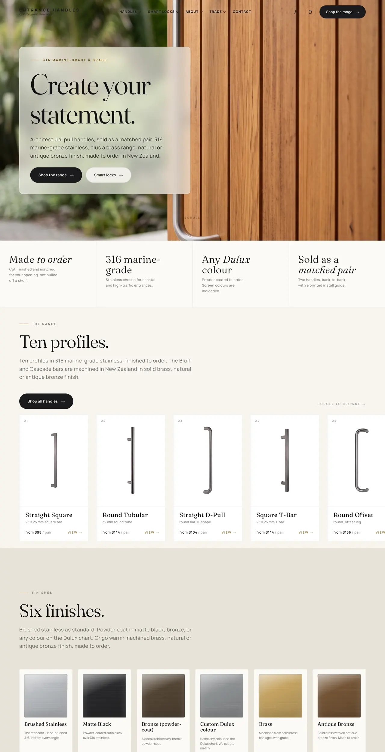 The Entrance Handles home page. A steel pull handle on a timber door beside the words Create your statement.